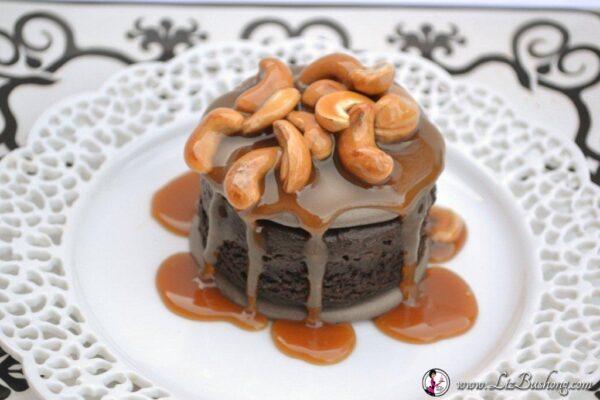 How to Make Chocolate Meringue Brownies with Cashew Caramel Sauce lizbushong.com, rich decadent brownie round sandwiched between two chocolate meringues topped with cashew caramel sauce.