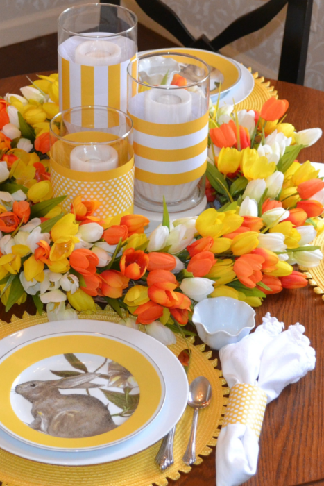  Playful bunnies on the yellow banded serve-ware, was the inspirational color scheme for this bright and cheery table.