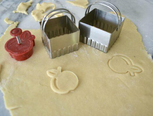 How to roll and cut out buttery crust into shapes for pie toppers.