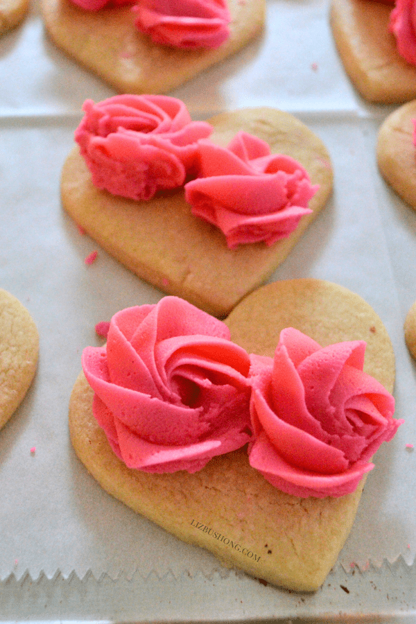 Heart Butter cookies decorated swirls, stars, ribbons featured All About the Table Magazine by Liz Bushong